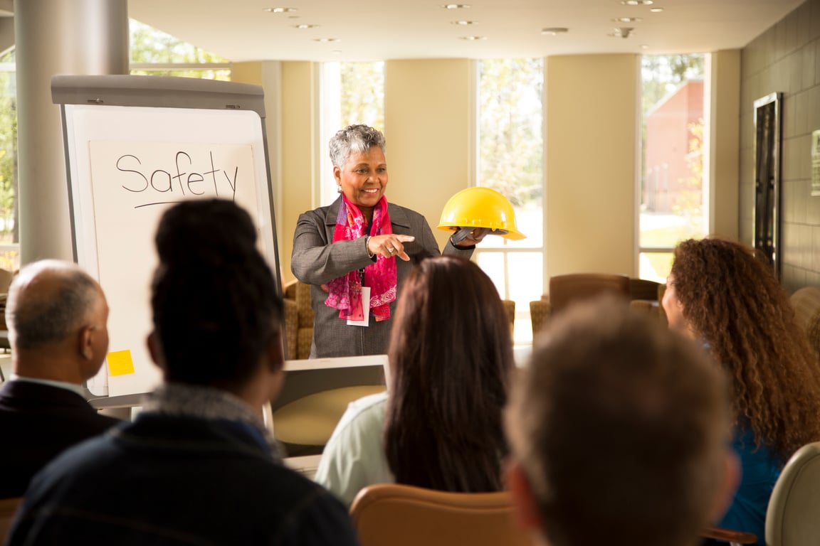 Safety in the workplace. Presentation with office workers.