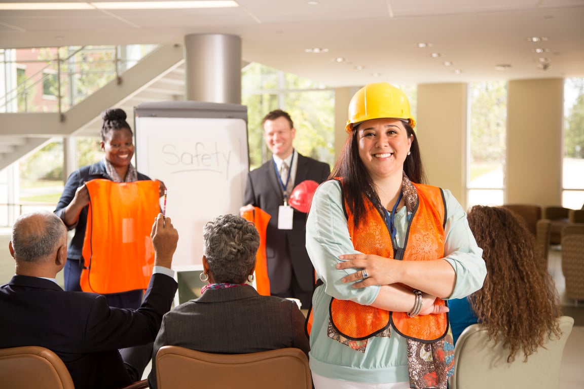 Safety in the workplace. Presentation with workers.